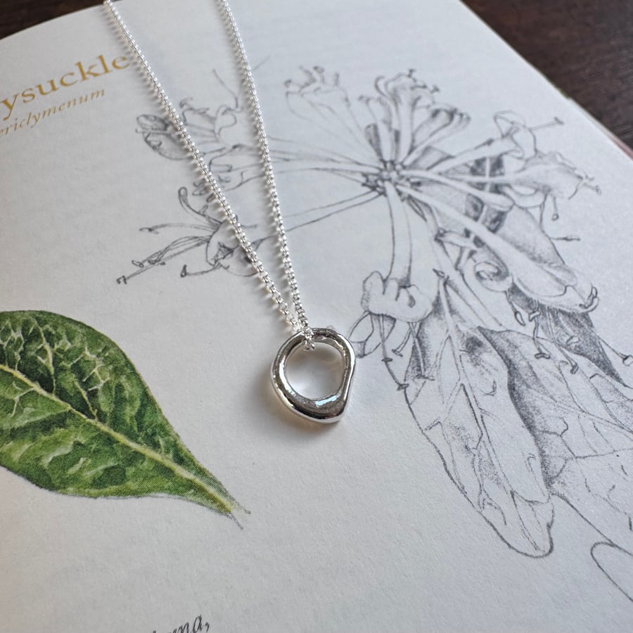 Hagstone charm pendant - recycled sterling silver charm amulet