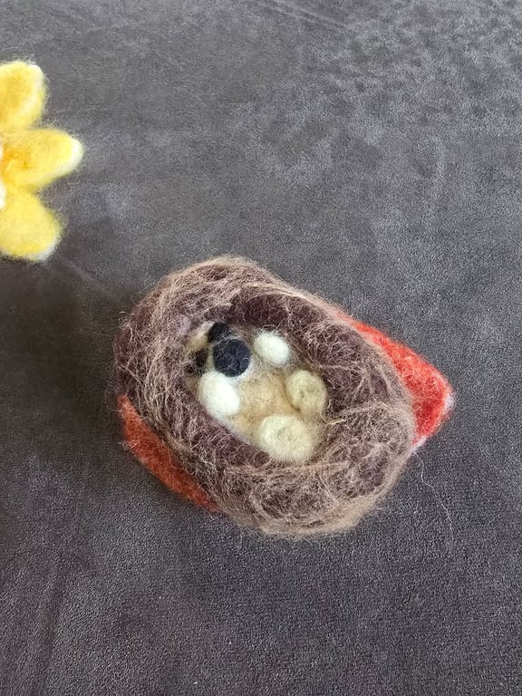 Needle felt Hedgehog on a leaf