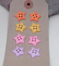 8 Cute Mixed Colour Star Shaped Buttons - Image 1
