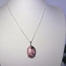 Rhodonite gemstone oval claw set pendant necklace