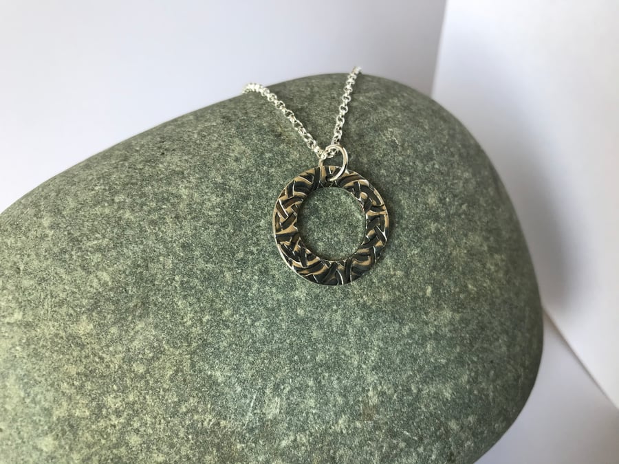Celtic inspired silver hoop pendant