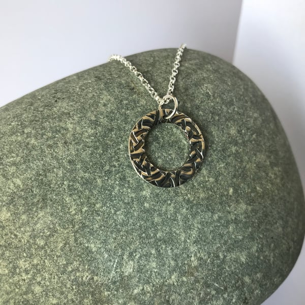 Celtic inspired silver hoop pendant