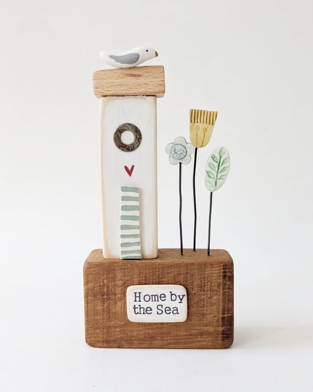 Tall Wooden Sea Hut with Clay Flowers and Seagull 'By the Sea'