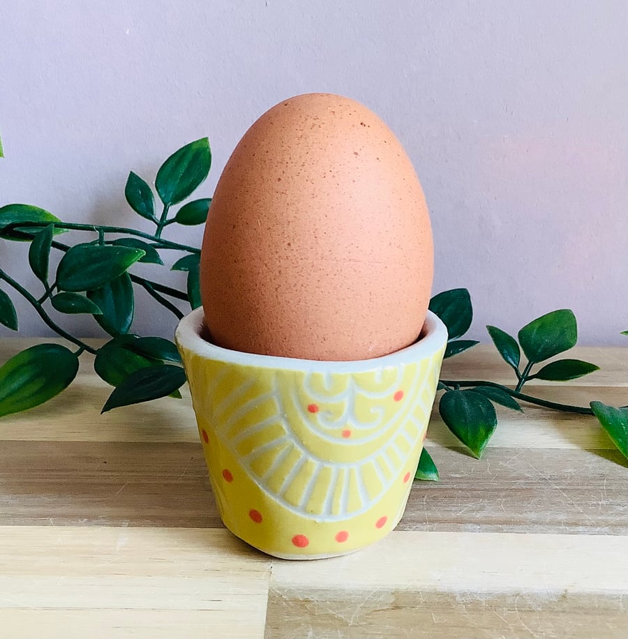 Handmade stoneware sgraffito egg cup yellow sunshine wave pattern 