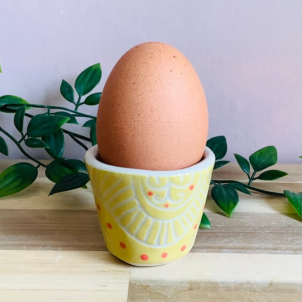 Handmade stoneware sgraffito egg cup yellow sunshine wave pattern 