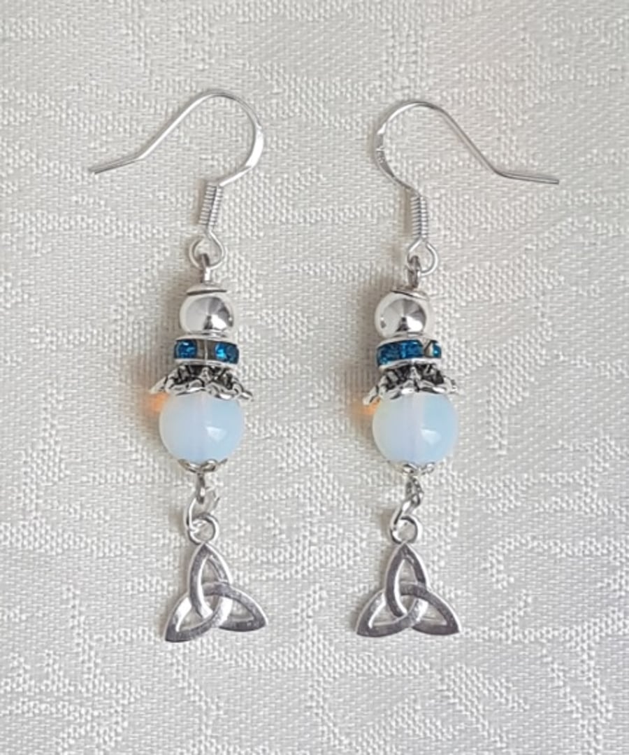 Beautiful Moonstone bead and Triquetra charm Earrings.