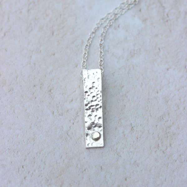 Sterling silver hallmarked bar pendant with gold accent