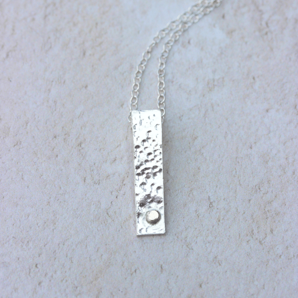 Sterling silver hallmarked bar pendant with gold accent