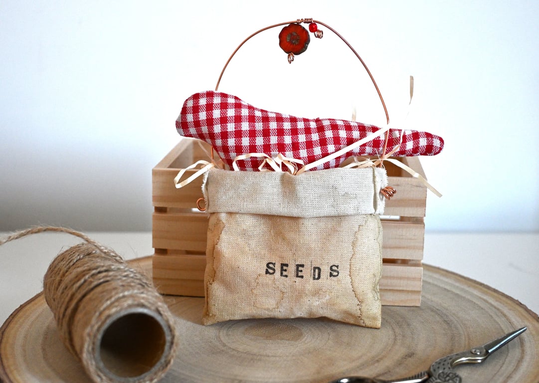 Primitive red bird seed bag collectable 