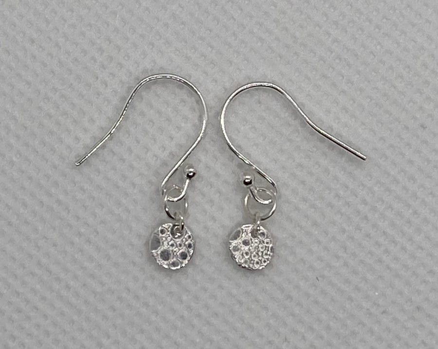 Tiny, pure silver circle earrings 