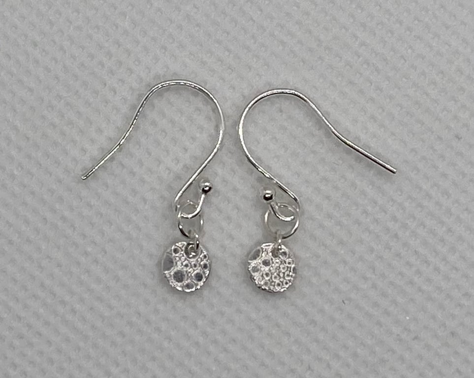 Tiny, pure silver circle earrings 