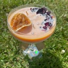Passion Fruit & Rose Handmade Soy Wax Candle in a cocktail glass with fragrance.
