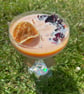 Passion Fruit & Rose Handmade Soy Wax Candle in a cocktail glass with fragrance.
