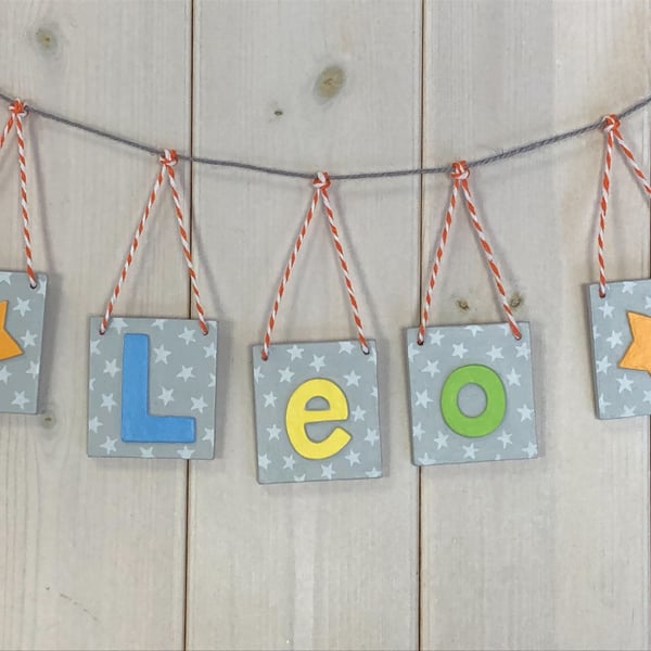Personalised name bunting in grey with bright coloured letters, Any Name!