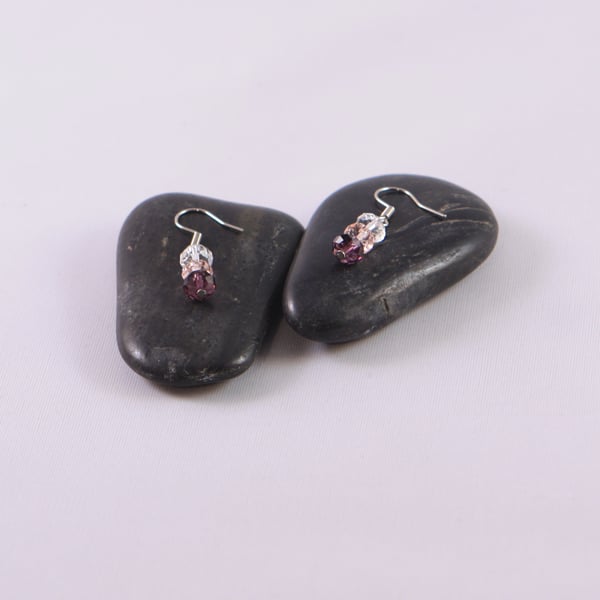 Handmade earrings with purple, pink and transparent crystals