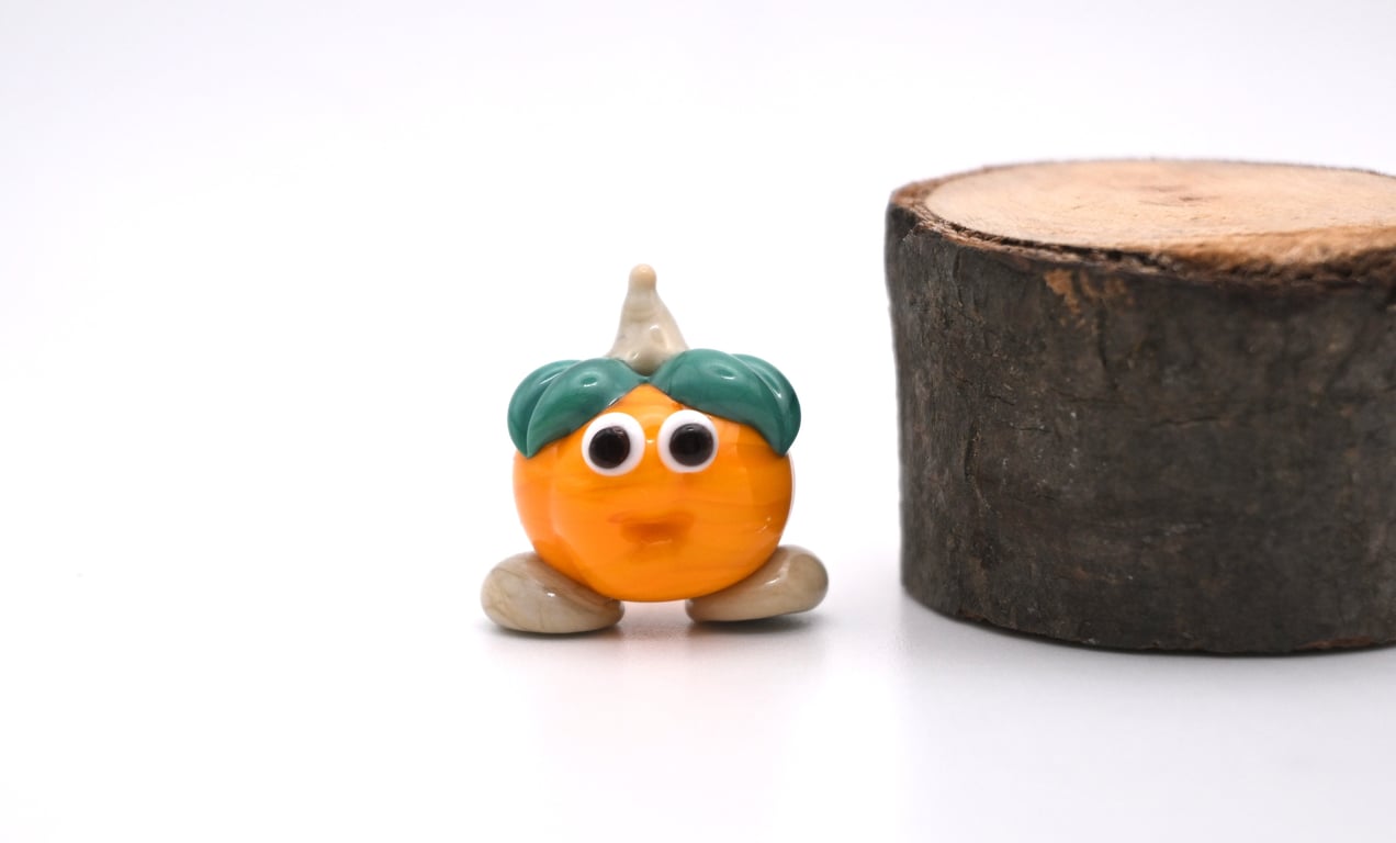 small glass pumpkin figure