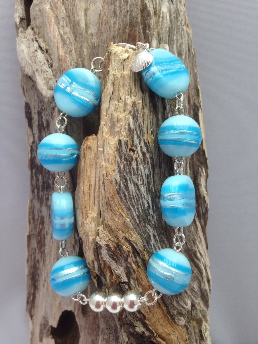 Beach inspired blue glass bead bracelet,sterling silver beads and silver shell