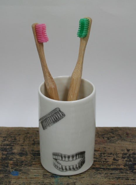 Porcelain cylinder with toothbrush image