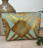 Copper gold and blue flat bottom zip pouch with ditsy floral lining 