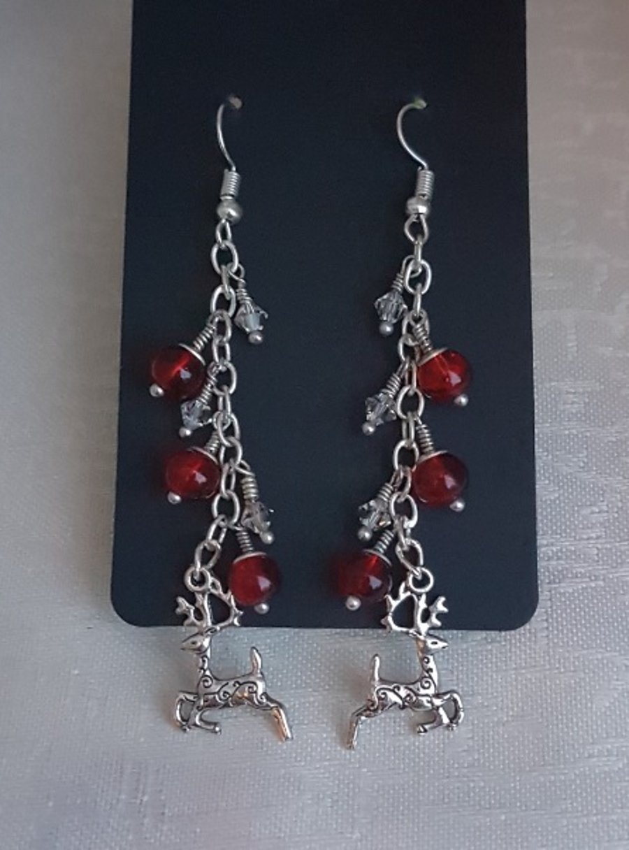 Dangly Red Bead and Reindeer charm Earrings.