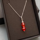 Red orange mix Swarovski Crystal & sterling silver pendant or necklace 
