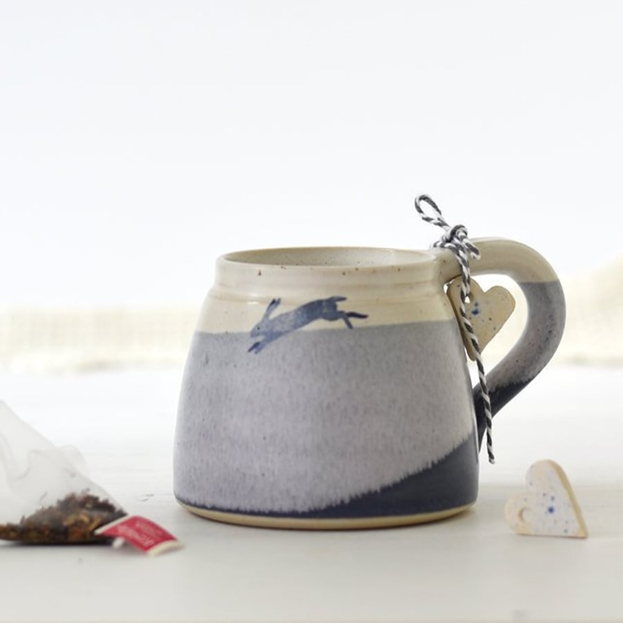 Handmade leaping hare rabbit mug, blue and white ceramic coffee tea mug