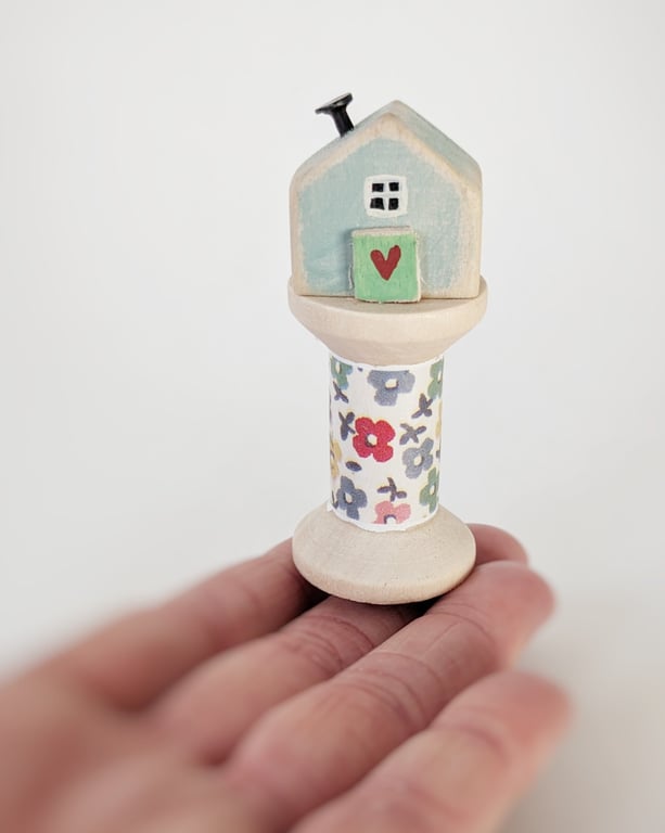 Little Wooden House on a Floral Wooden Bobbin 