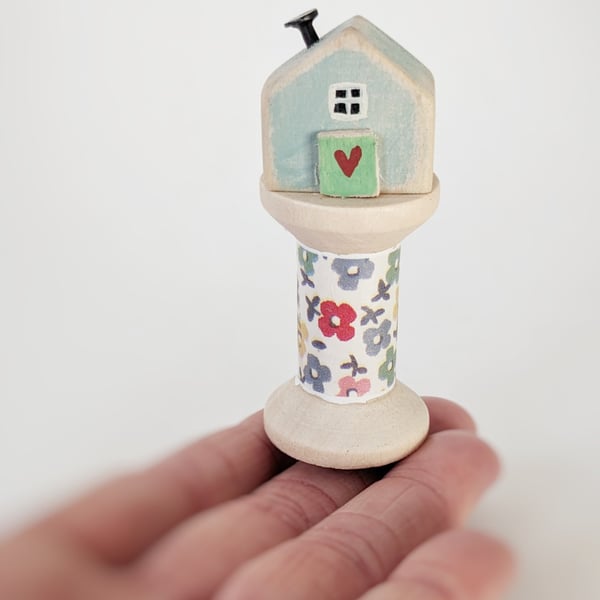 Little Wooden House on a Floral Wooden Bobbin 