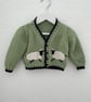 Green baby cardigan with sheep designs on the front - Image 8