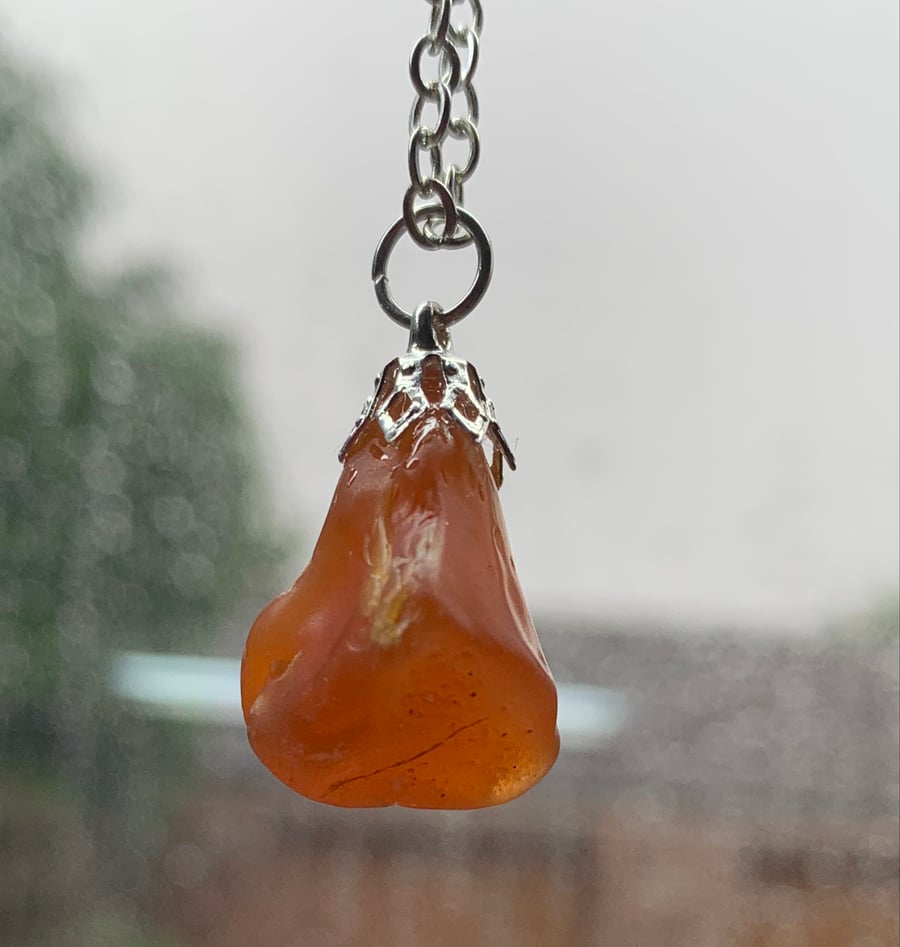 Silver plate and carnelian pendant 