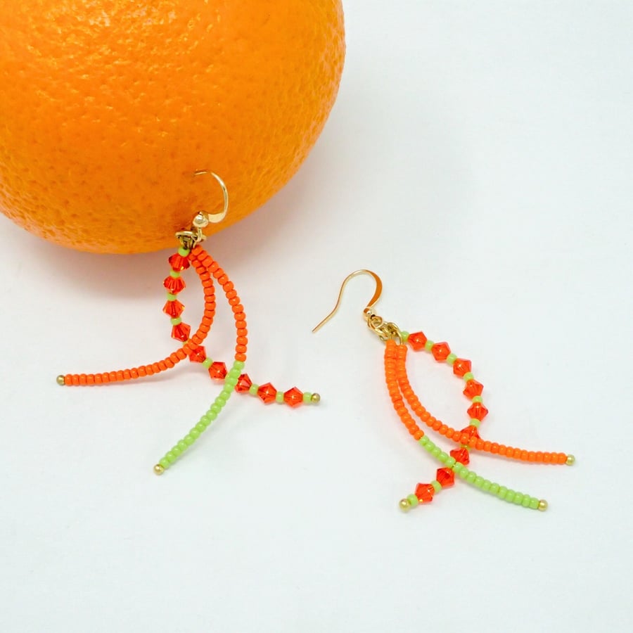Bright Orange Beaded Dangle Earrings  with Green and Sparkly Crystals.