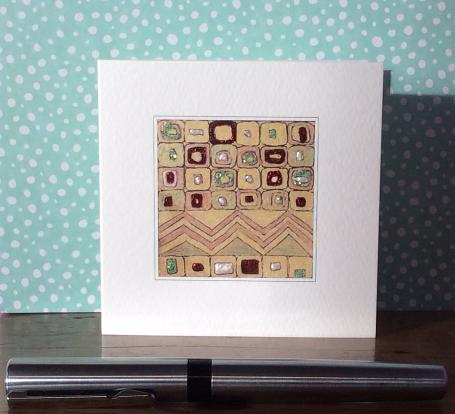 Gold patterned embellished blank card.