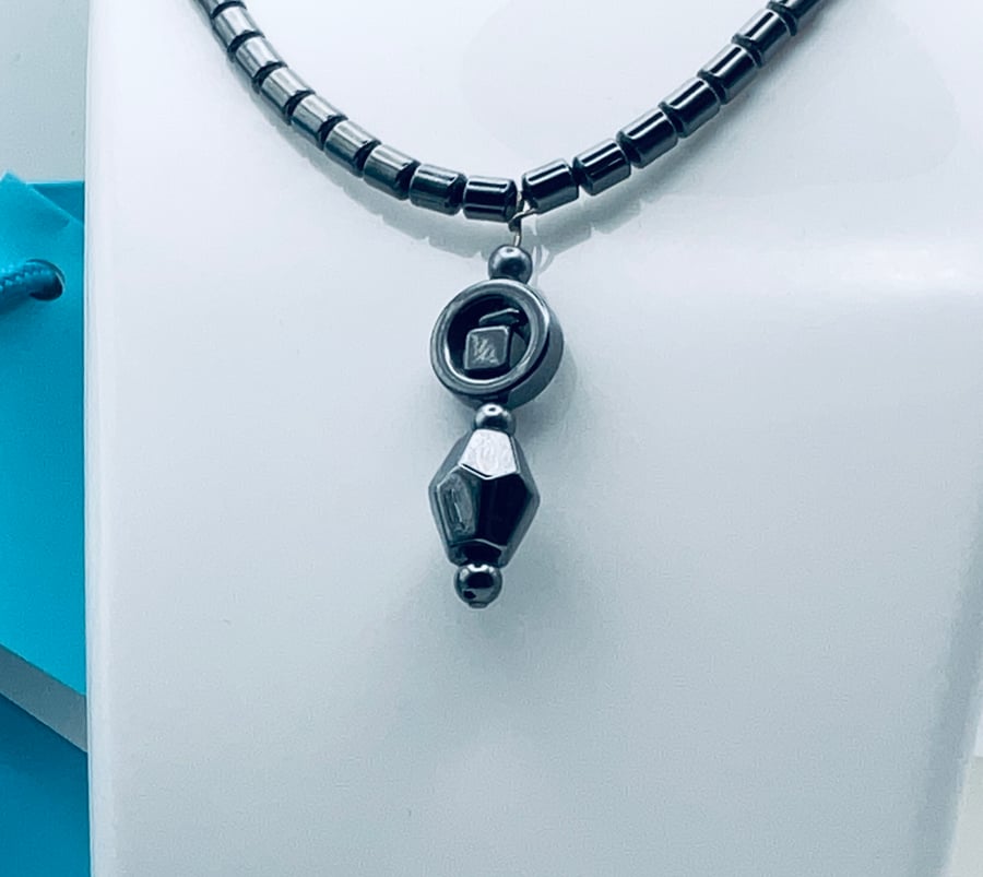 Bargain traditional hematite necklace with pendant
