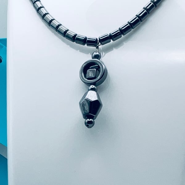 Bargain traditional hematite necklace with pendant