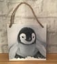 Emperor Penguin Chick, wooden hanging wall plaque.