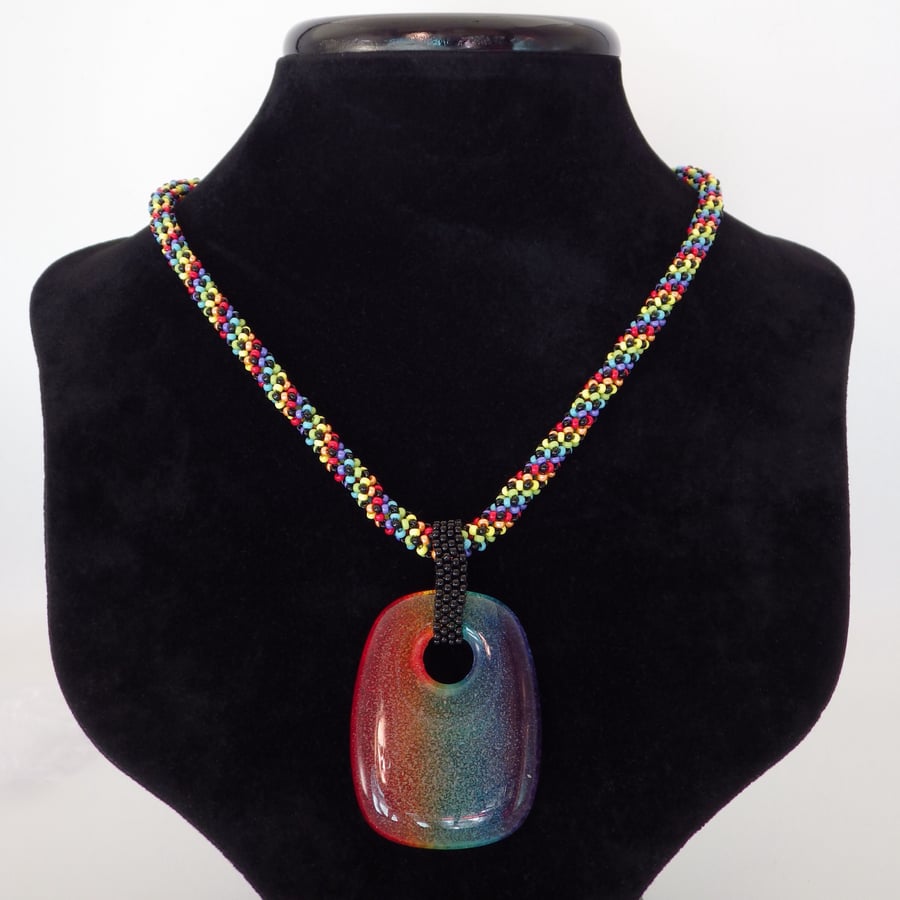 Rainbow beadwoven necklace with fused glass pendant