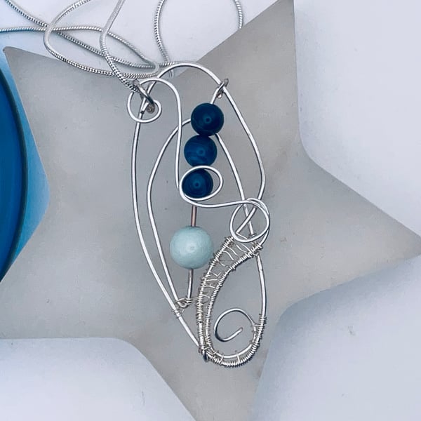 Luscious lapis lazuli and amazonite wire woven pendant