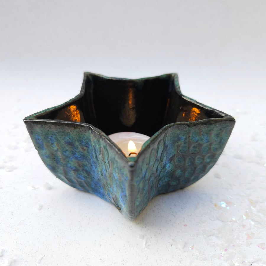 Candle Holder in black porcelain, with carved texture - star