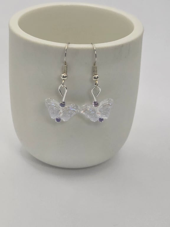Clear glass beaded buterfly earrings with purple and blue beads 