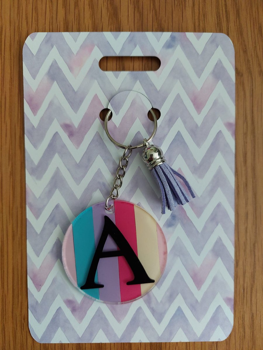 Stripe acrylic keyring with the initial of your choise.