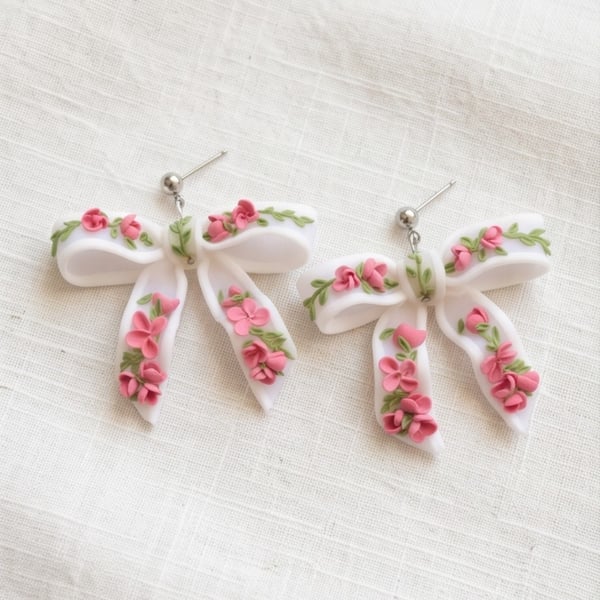 Bow translucent earrings with floral pattern
