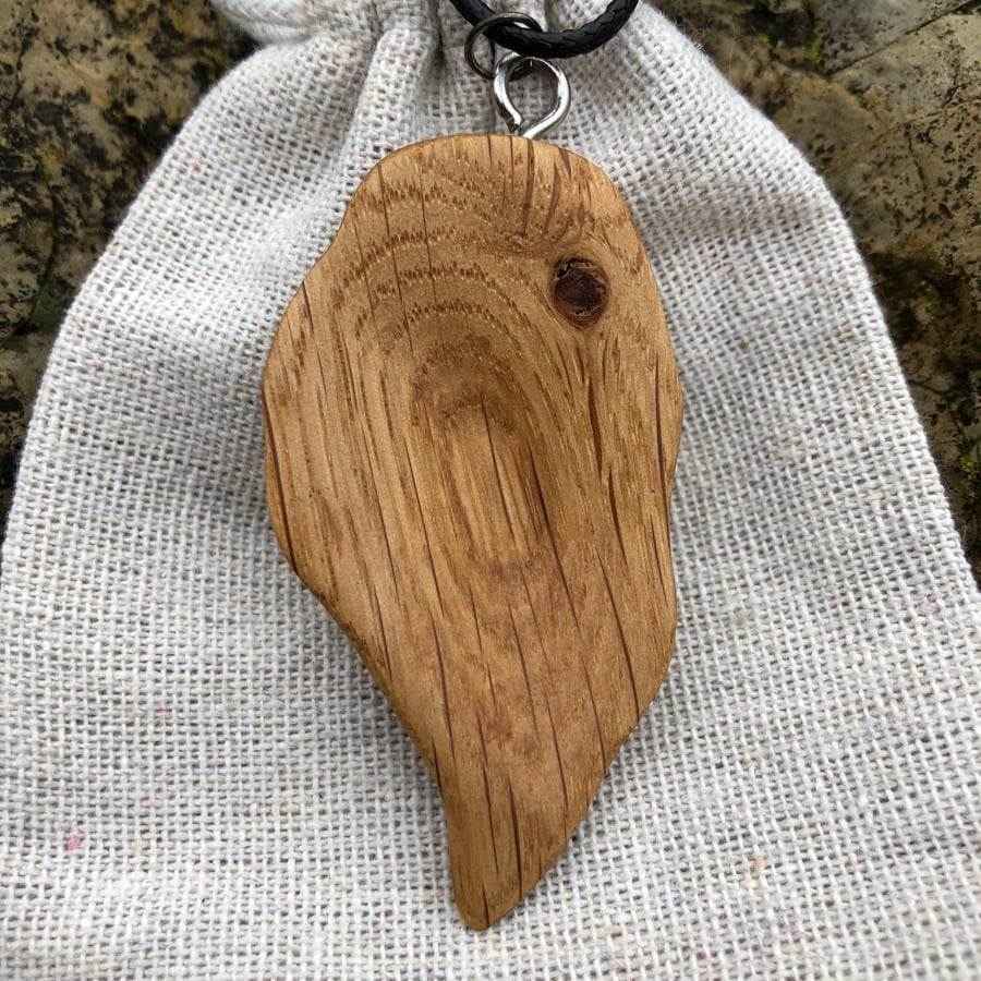 Boho chic hand carved oak wood pendant 