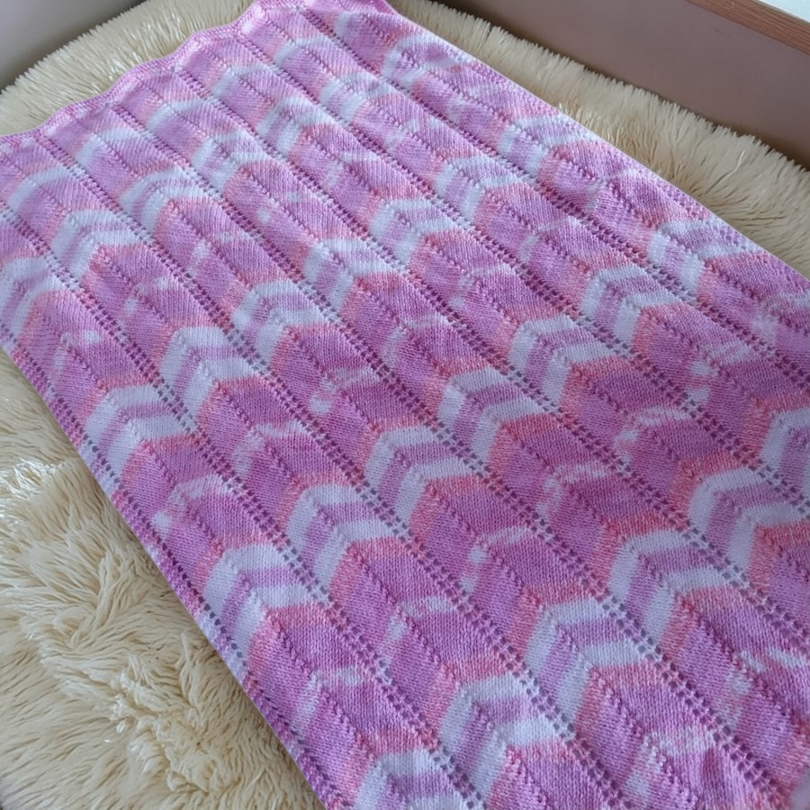 Baby pram blanket hand knitted in pinks and white Chevron Afghan 