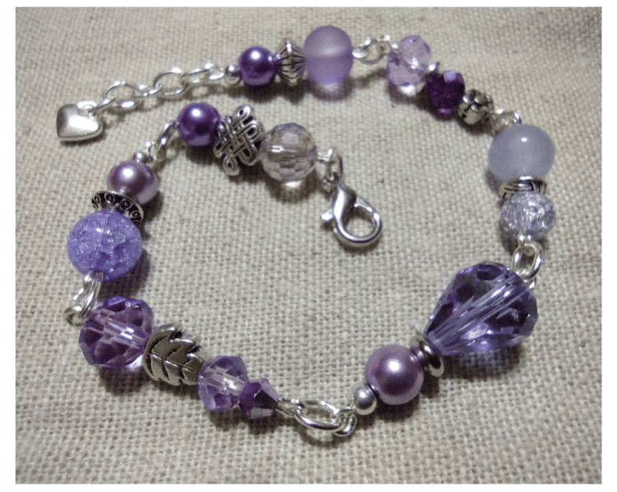 Lilac love handmade beaded bracelet. With Austrian crystals & crackle quartz 