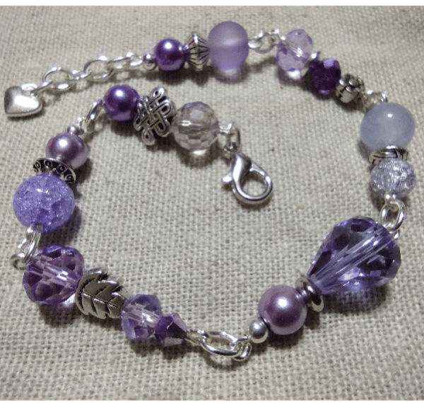 Lilac love handmade beaded bracelet. With Austrian crystals & crackle quartz 
