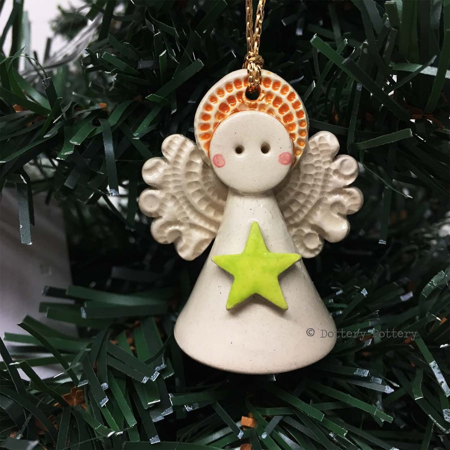 Teeny little ceramic angel Christmas decoration green star design pottery angel