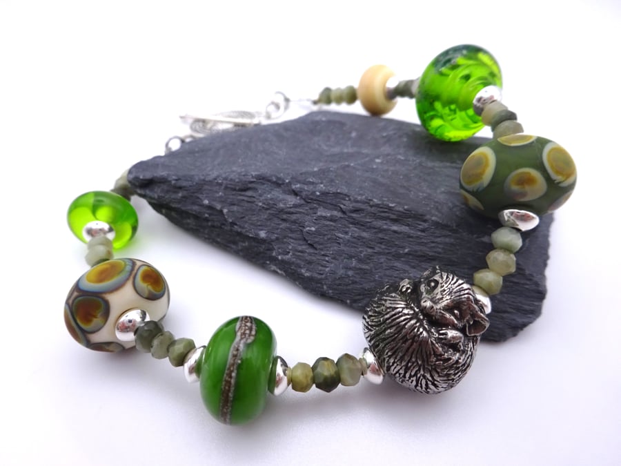 green lampwork glass beaded bracelet, hedgehog jewellery