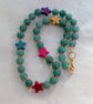 Green aventurine and multicoloured howlite star knotted cord necklace 