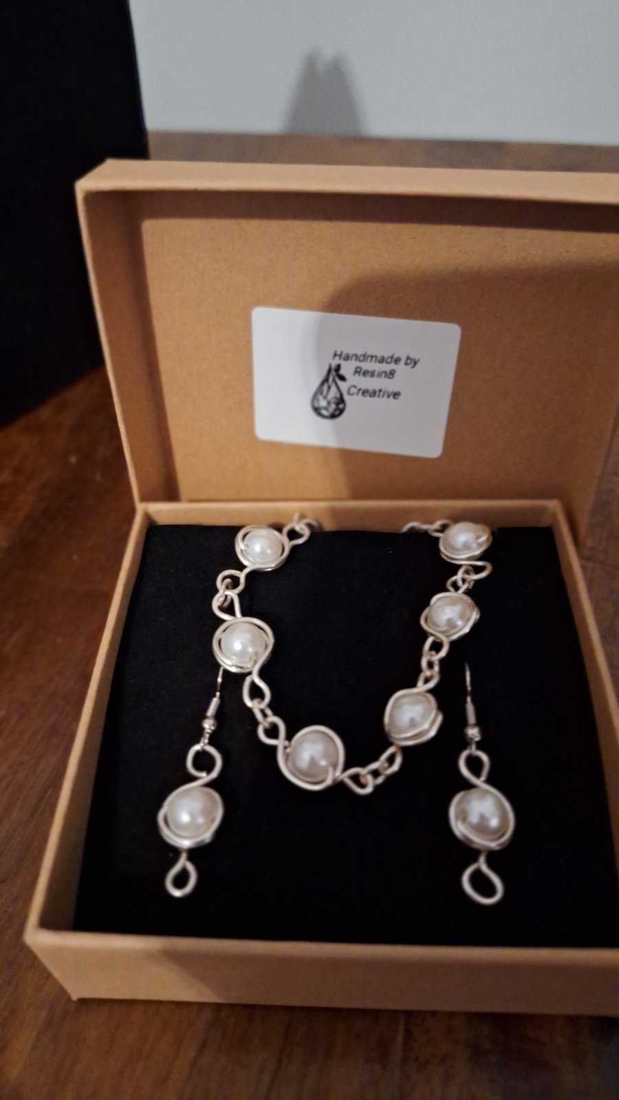 Silver wire wrapped pearl bead bracelet and matching earrings