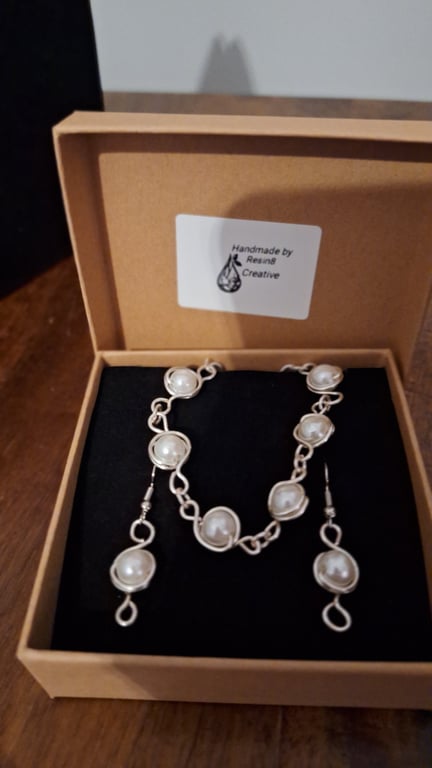 Silver wire wrapped pearl bead bracelet and matching earrings